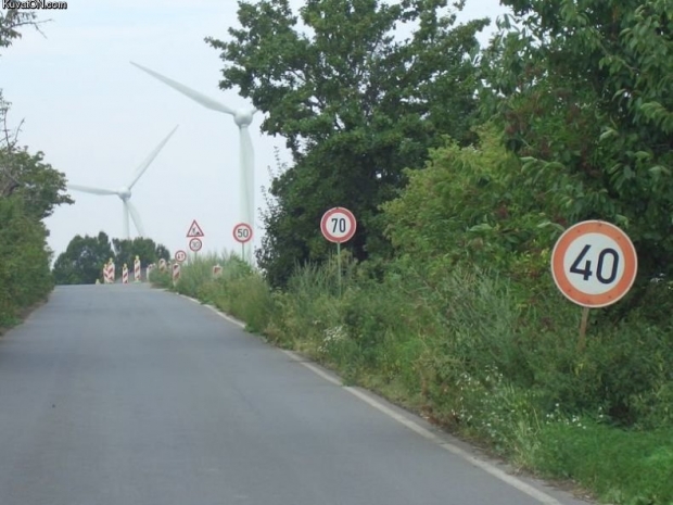 Three speed limit signs